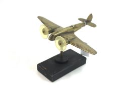 A model of a Blenheim bomber cast in brass on wood