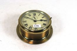 A British made brass ships clock. 6" dial with Rom