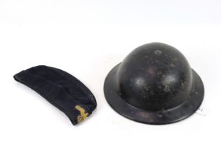 A British "Plasfort" helmet with a German (PATTERN