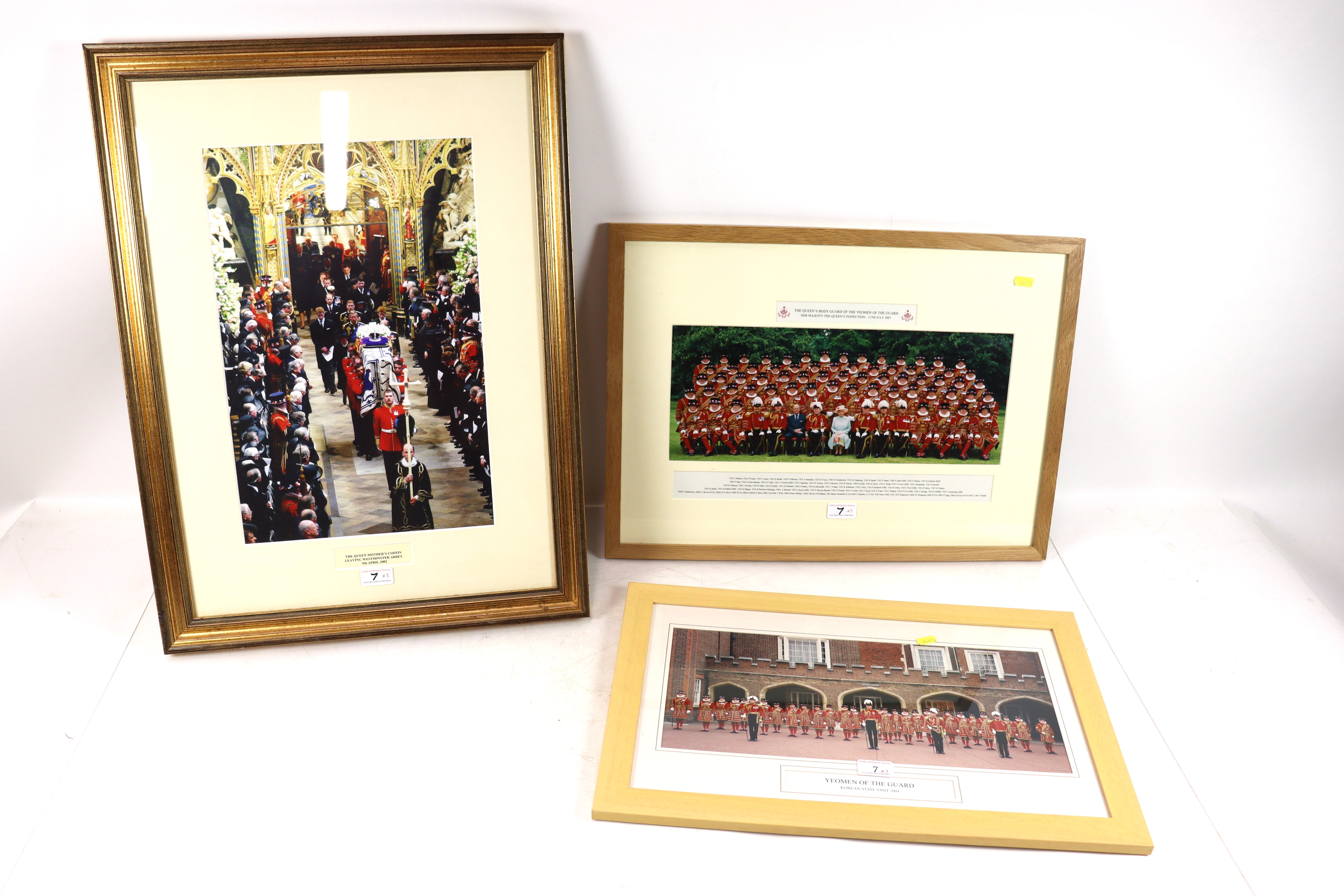 Three framed and glazed photographs depicting Yeom