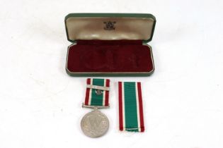 A cased W.R.V.S. long service medal with clasp and
