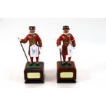 Two painted models of the Yeoman of the Guard (one