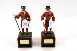 Two painted models of the Yeoman of the Guard (one