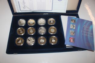 The Queen Mother Centenary coin collection in case