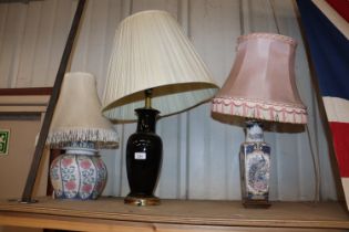 Three table lamps and shades