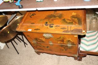 A Chinese cabinet with bird and floral decoration w