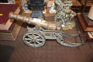 A brass model cannon