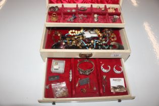 A cantilever jewellery box and contents of various
