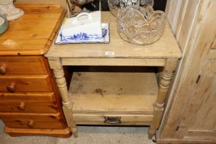 A stripped pine side table fitted single drawer be