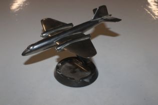 A desk ash tray decorated with model aircraft