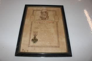 A WWI French Bravery medal with framed award scrol