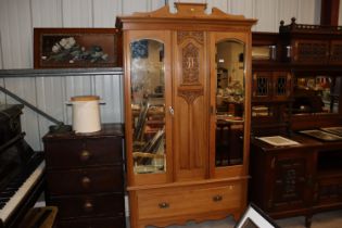 A satin walnut mirror fronted wardrobe fitted sing