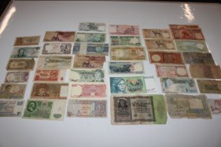 A collection of various world bank notes