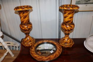 A pair of faux walnut urns and matching convex wal