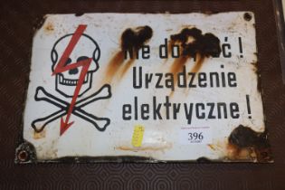 A Polish warning sign "Fence Electrified"