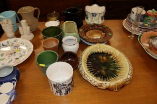 A collection of decorative pottery to include majo