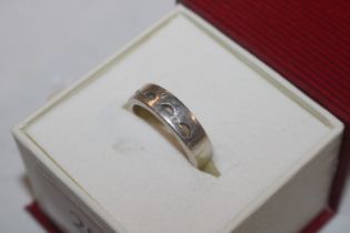 A men's vintage Sterling silver and diamond ring,