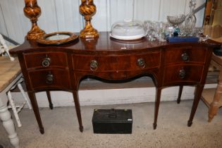 A Regency serpentine fronted sideboard fitted five