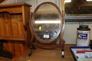 A 19th Century oval swing framed mirror