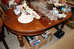 A Victorian mahogany extending dining table