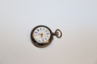 A fob watch set with white stones