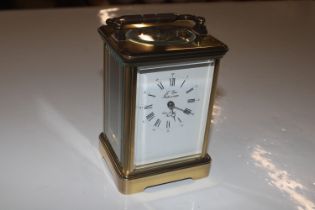 A French brass cased L'epee carriage clock