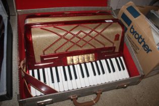 A Hohner Virtuola 3 piano accordion in fitted case