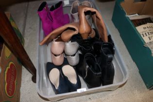A box of miscellaneous ladies shoes and boots