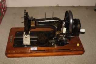 A vintage Frister & Rossmann hand sewing machine