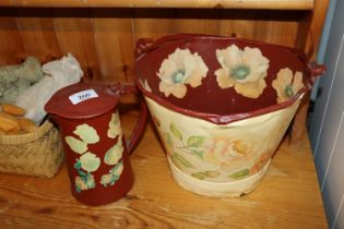 A painted swing handled pail and jug