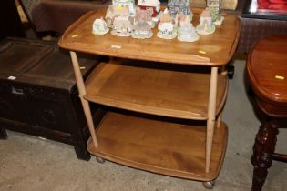 A light Ercol three tier trolley