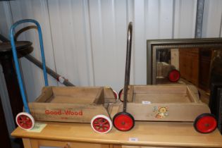 A Goodwood and one other child's toy trolley