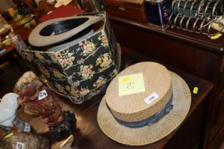 The Cavalier straw boater; and an Alkit Top Hat
