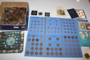 A box of various mixed coinage to include Churchil