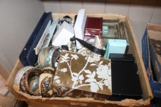 A box containing various trinket boxes, jewellery