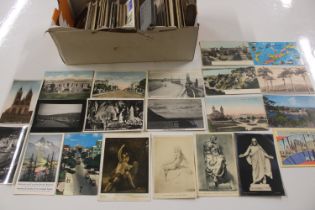 A box containing post-cards and other ephemera