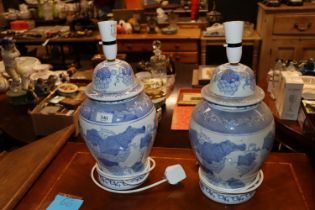 A pair of blue and white Oriental baluster table l