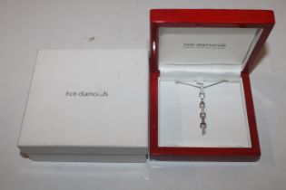 A boxed Hot Diamonds necklace