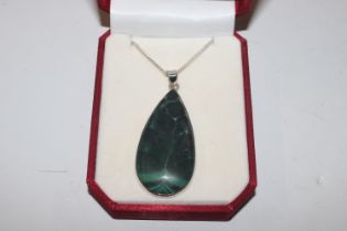 A large Sterling silver malachite pendant and chai