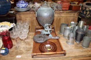 A twin handled tray; a samovar; a silver plated mirror etc.