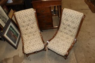 A pair of Victorian walnut children's nursing chai