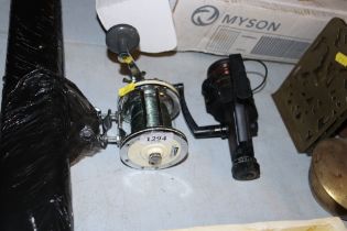 A Mitchel 624 fishing reel and a Shakespeare fishi