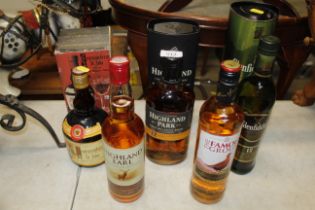 A collection of various whisky and a Commandaria S