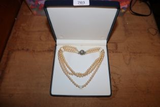 A cultured pearl necklace