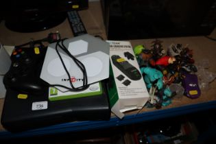 A X-Box 360 lacking power lead, together with remo