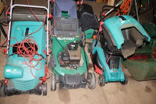 A Qualcast petrol rotary lawn mower