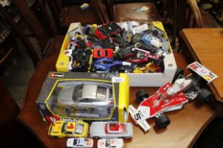 A collection of various diecast model toy cars and