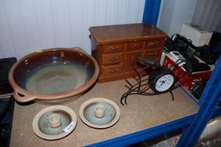 A pair of Studio Pottery candlesticks signed to th