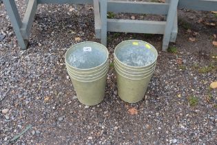 A quantity of galvanised planters