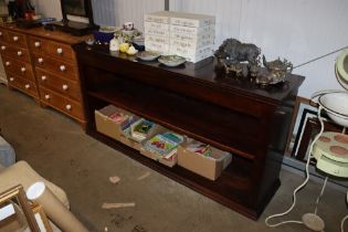 A modern hard wood shelving unit